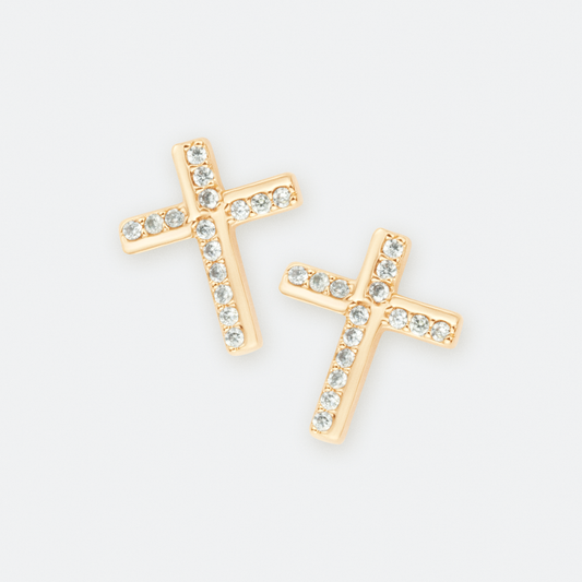 The Crux earring by Ocarina, an 18K gold-plated cross-shaped stud adorned with sparkling zircon stones. A timeless and symbolic jewelry piece representing faith and elegance, displayed against a clean white background.